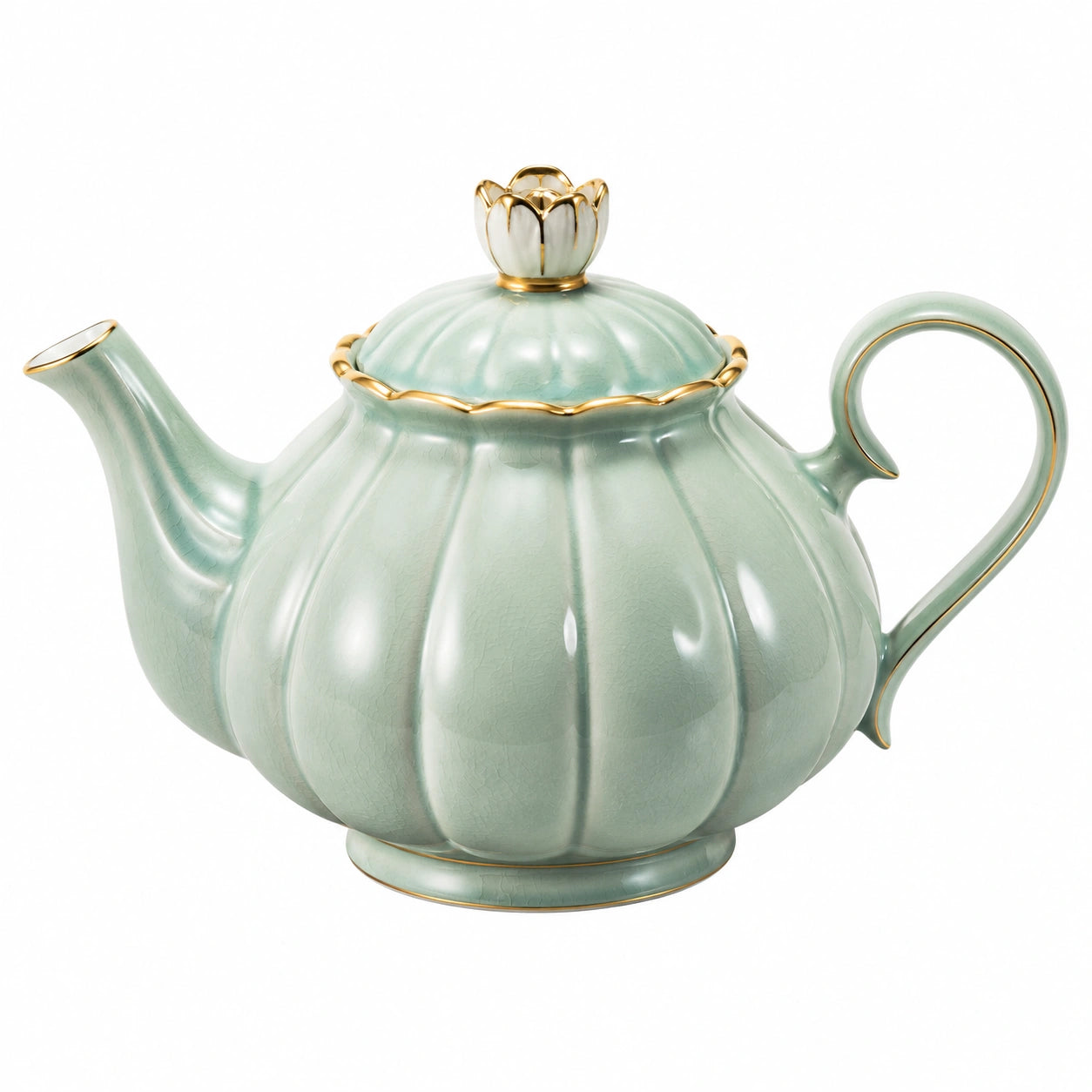 Théière en porcelaine vert avec détails dorés
